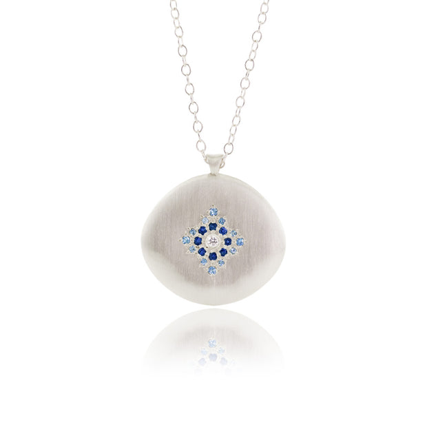 Sterling Silver Diamond And Blue Sapphire Pendant
